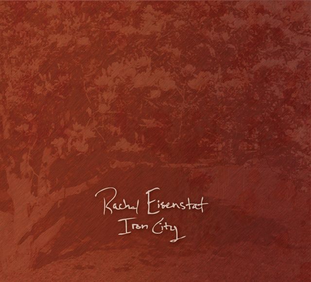 rusty red brown subtle album art of trees and maybe a house